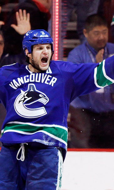 Bieksa's OT goal lifts Canucks past Coyotes